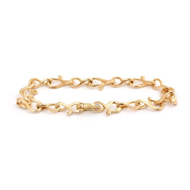 Calligraphy armb�nd, stort, i guld fra Per Borup