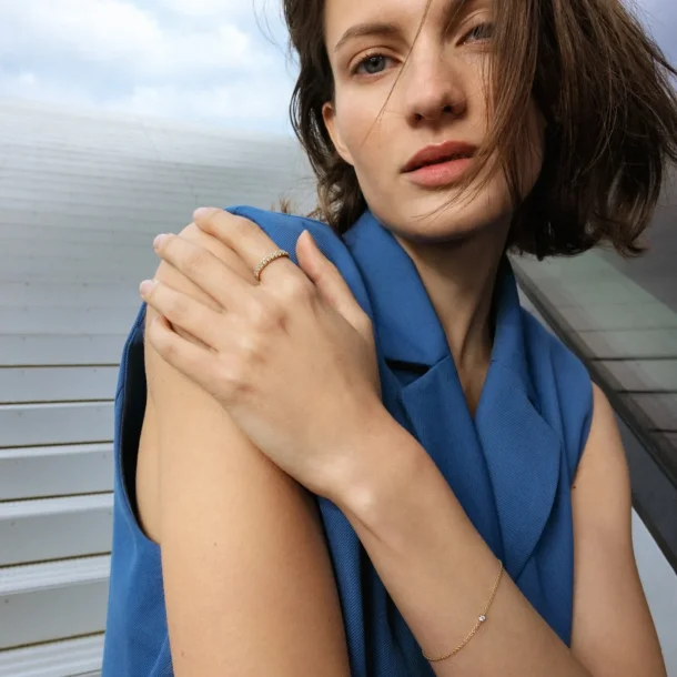 Signature armb�nd i guld med diamant 0,05 ct fra Georg Jensen