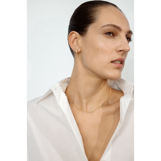 Signature rering i 18 kt guld med diamanter fra Georg Jensen