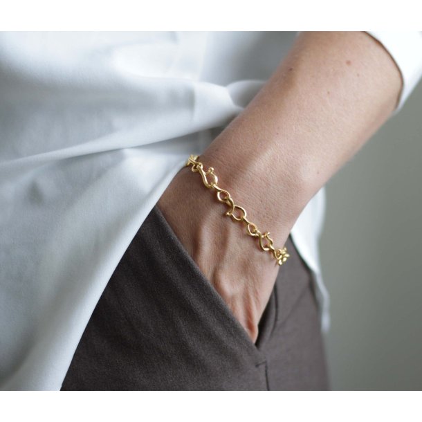 Calligraphy armb�nd, stort, i guld fra Per Borup