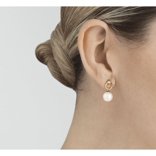 Magic �reringe i guld med perle og diamant fra Georg Jensen