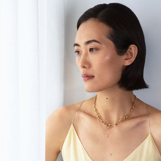 Mercy halskde med vedhng i guld med 0,05 ct. solitaire brillant fra Georg Jensen